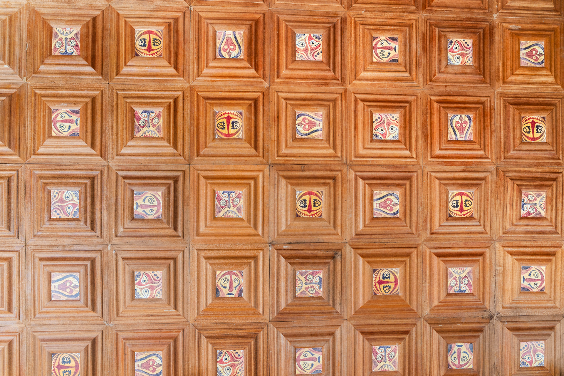 Hand-painted ceiling panels — each square a separate motif