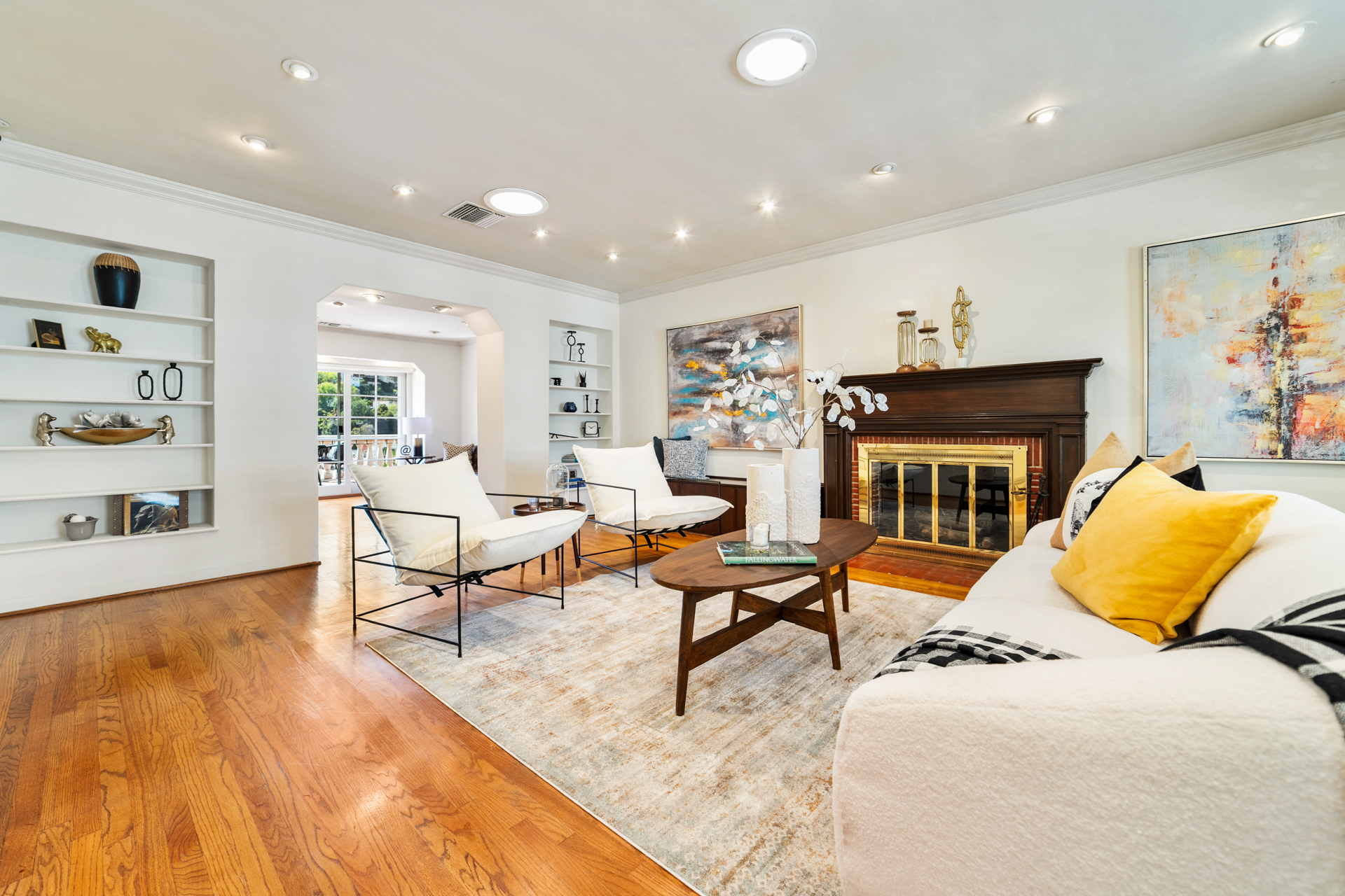 Living room — oak floors, original mantel